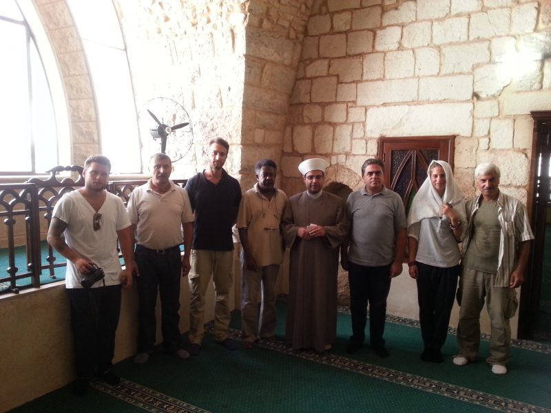 صورة بعثة الآثار البولندية تعاين جامع برجا الكبير